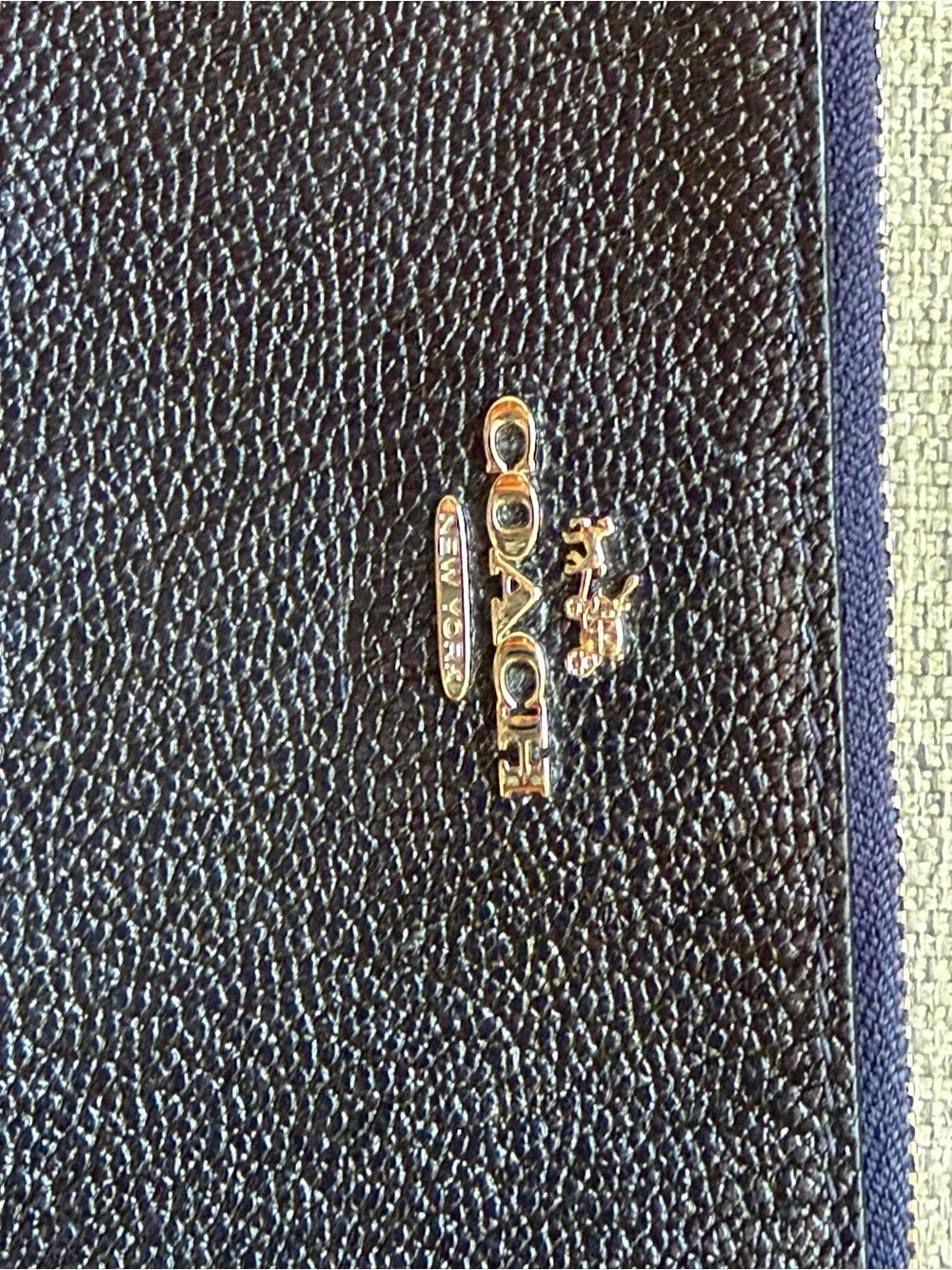 Coach Navy Pebbled Leather Wristlet with Gold Logo